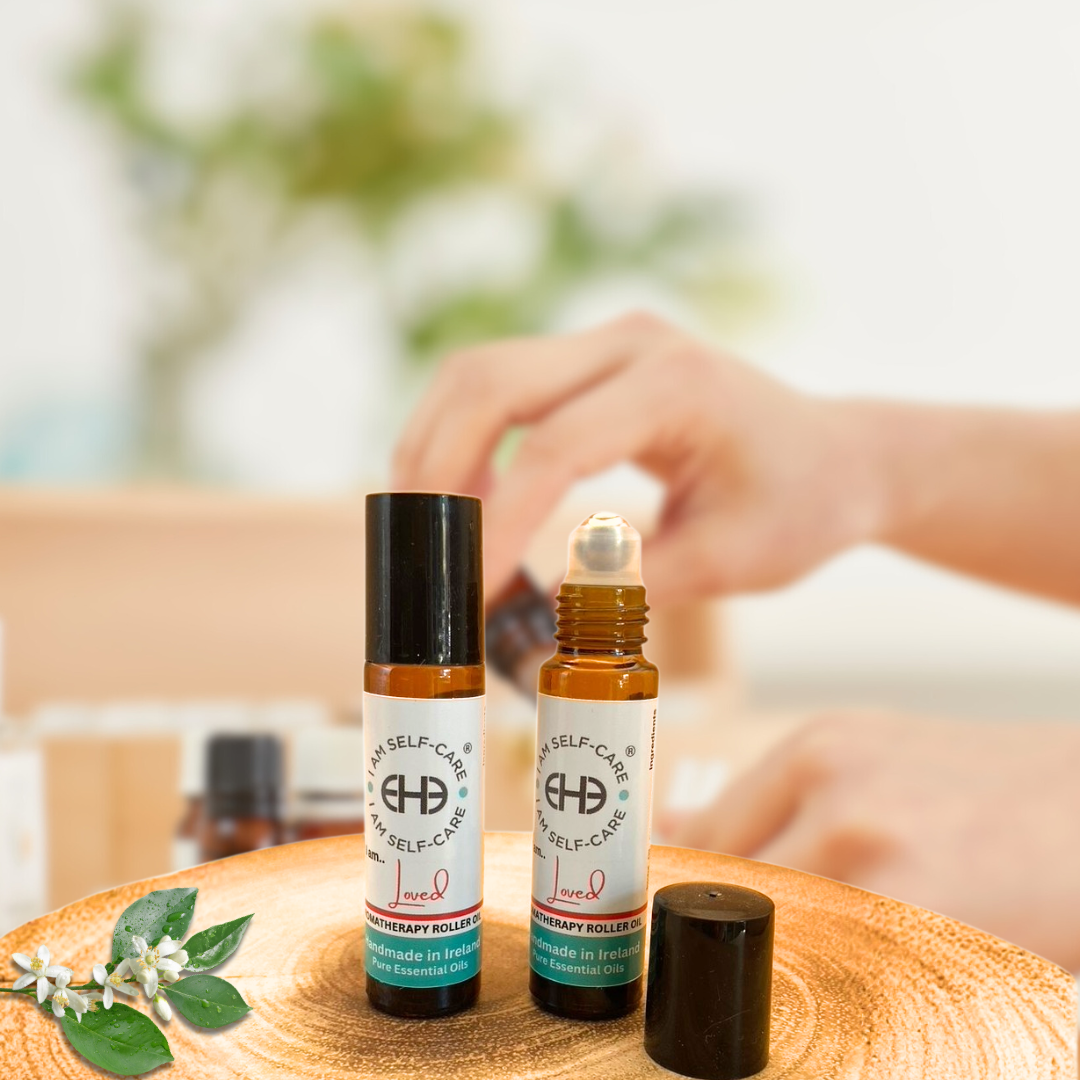 2 Aromatherapy Roller Oil bottles on a wooden surface