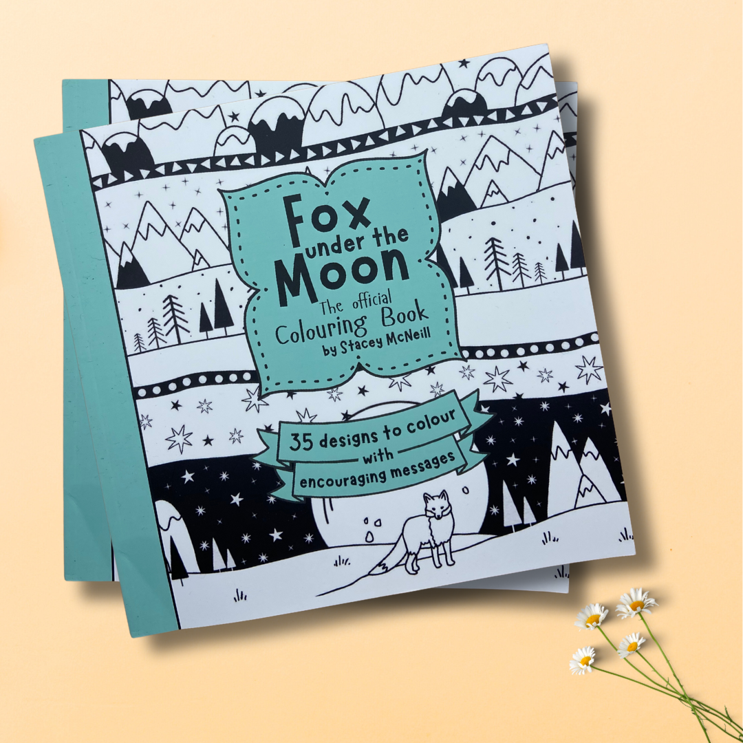 Fox under the Moon mindfulness coloring book with mountain and forest design on a beige background