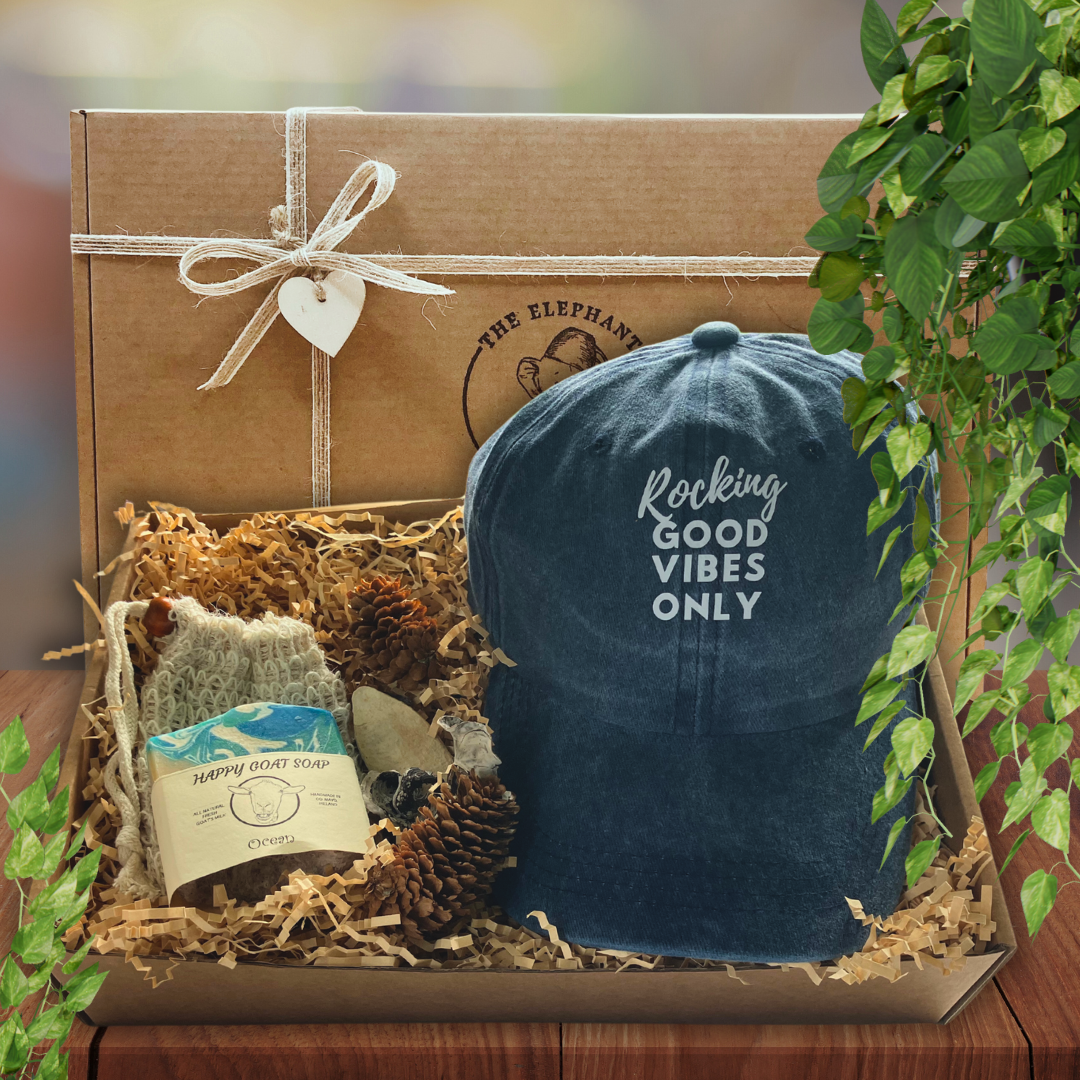 Care package with Rocking Good Vibes baseball hat