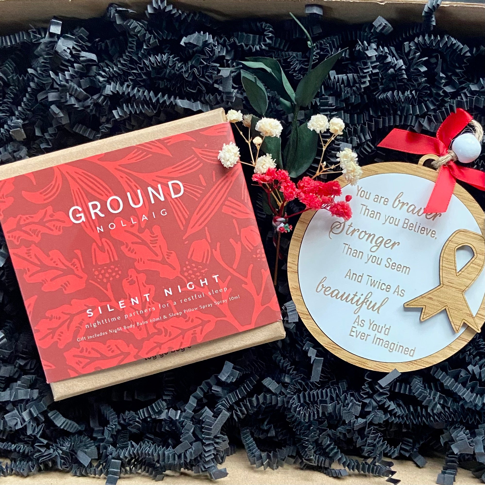 Christmas gift box with night balm, sleep spray and a cancer survivor decoration