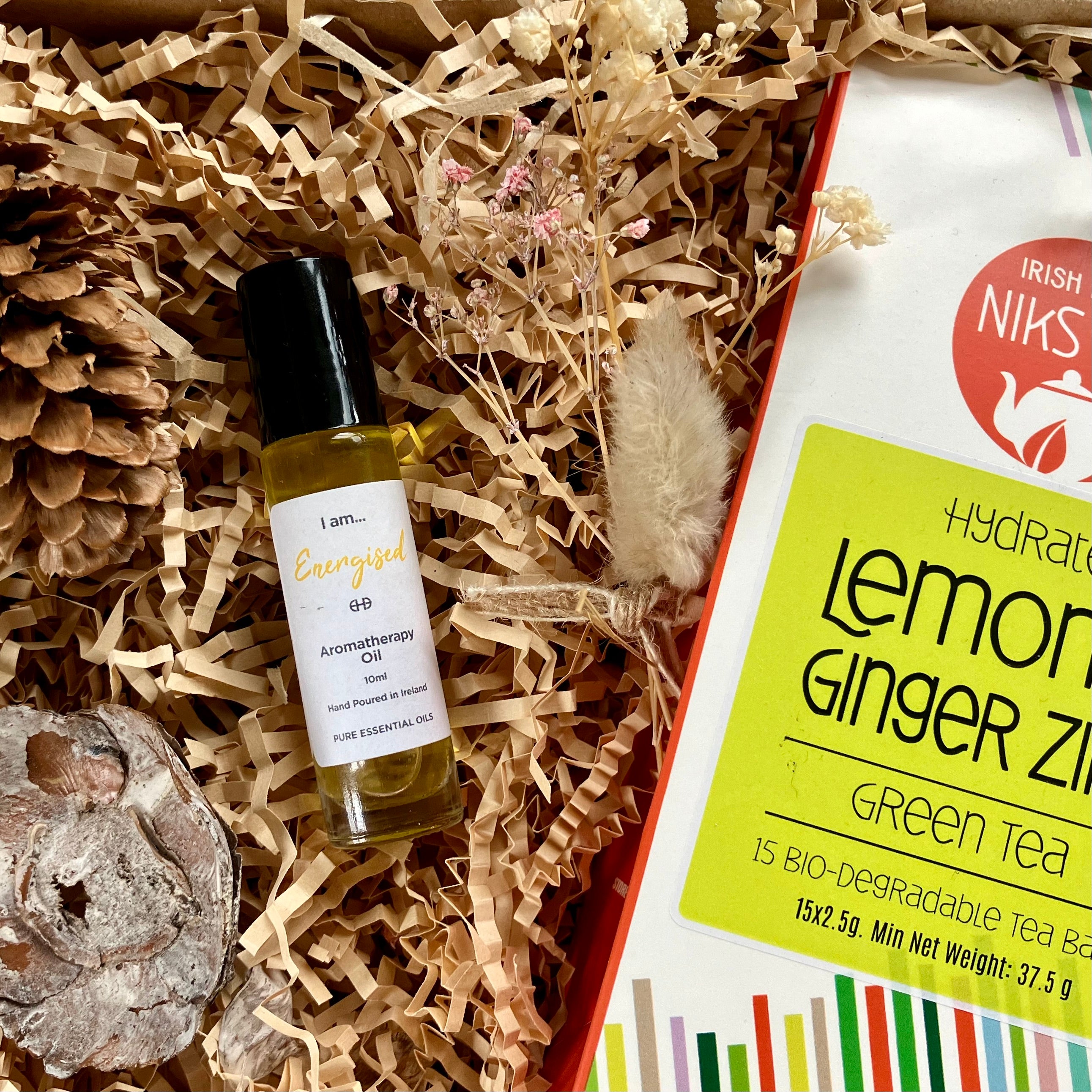 Care package with aromatherapy oil and wellness tea