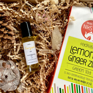 Care package with aromatherapy oil and wellness tea