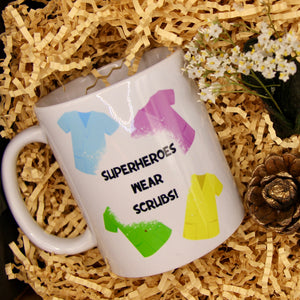 Superheros wear scrubs mug