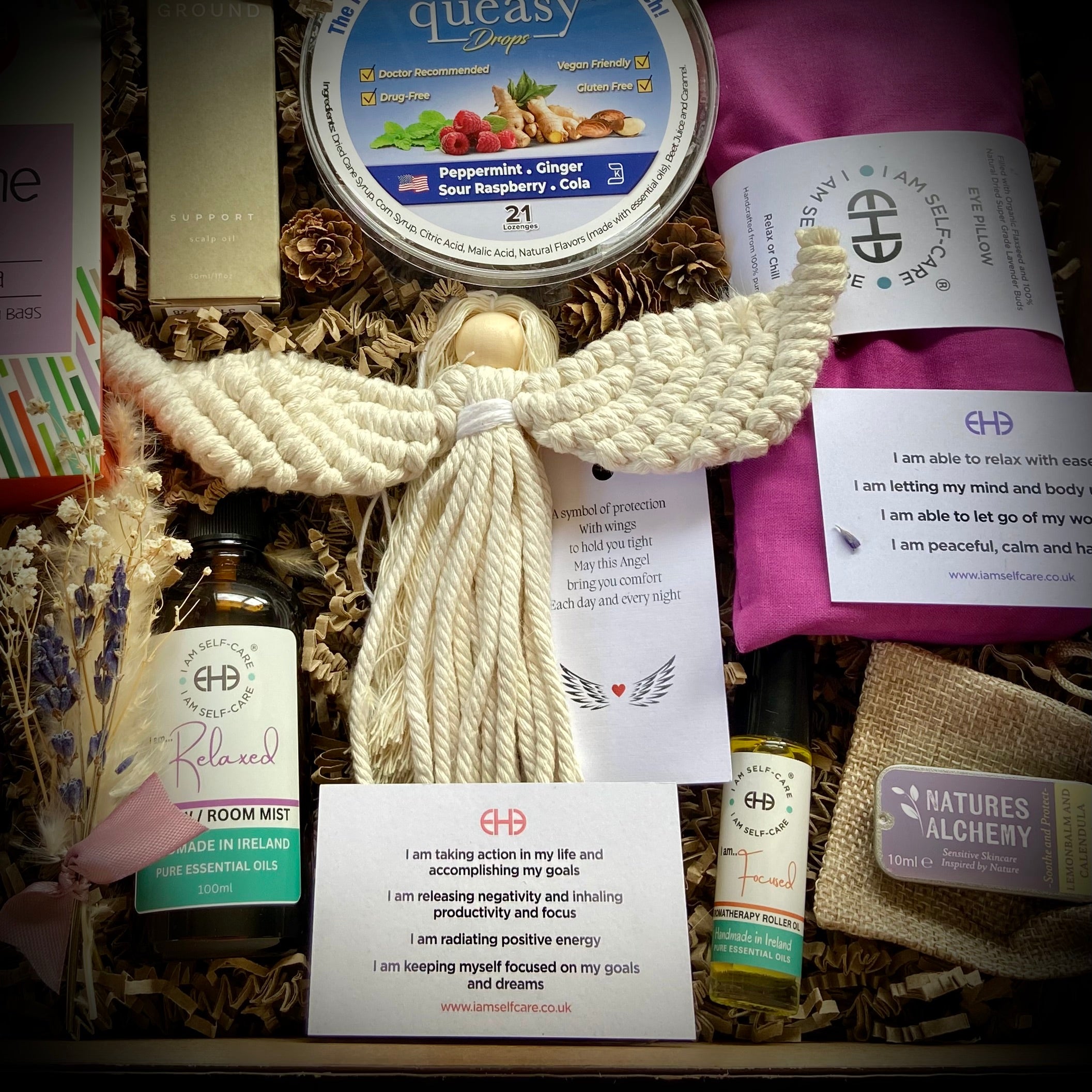 Care Gift basket with angel figurine, candles, aromatherapy rollerball and pillow mist, lip balm, eye pillow and queasy drops