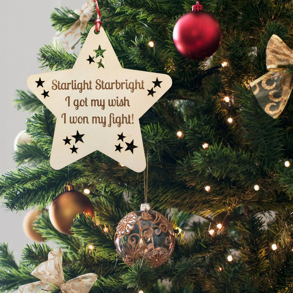 Gift idea for cancer survivor. Christmas tree decoration. Wooden star with the words 'Starlight Starbright, I got my wish, I won my fight'