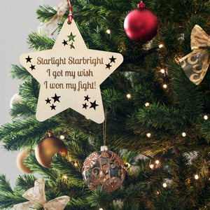 Gift idea for cancer survivor. Christmas tree decoration. Wooden star with the words 'Starlight Starbright, I got my wish, I won my fight'